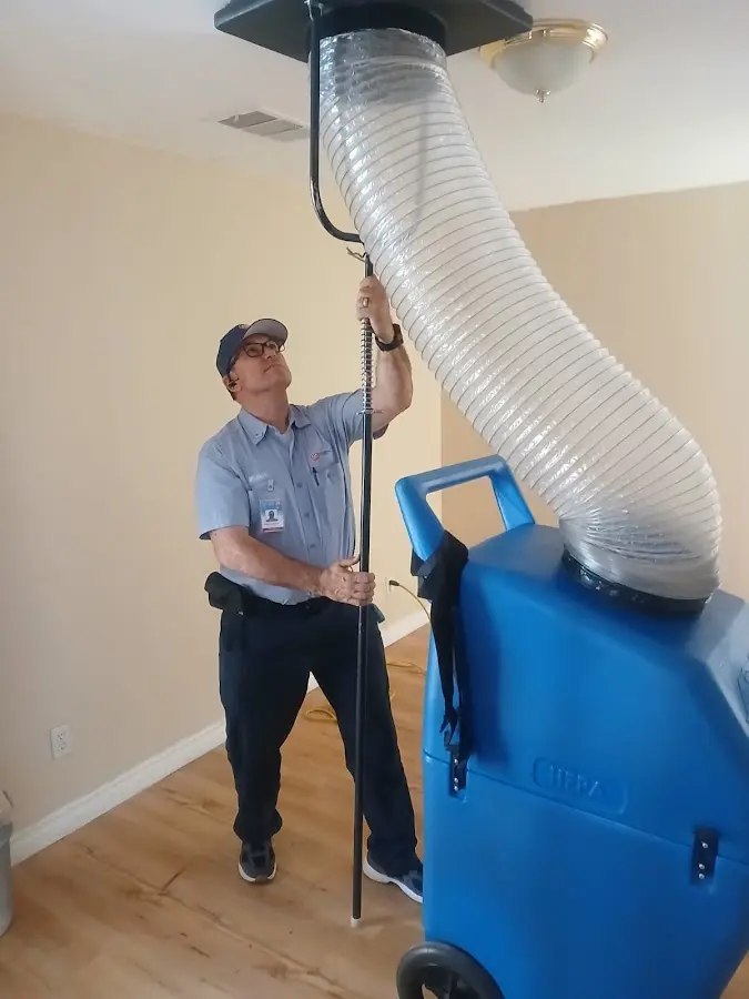 Mini Split Installation technician using HEPA equipment in Chanhassen